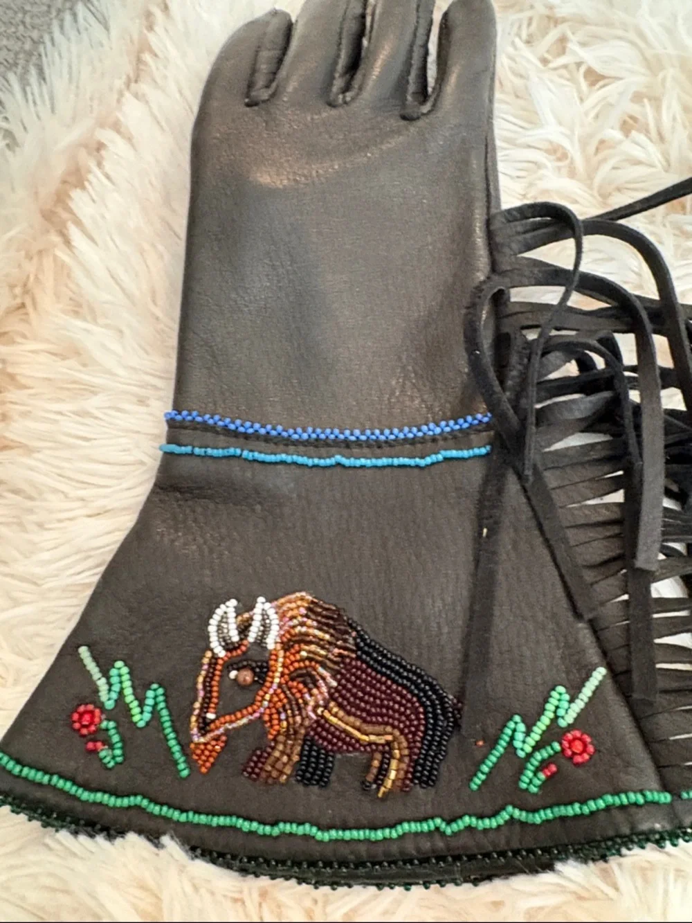 Fringed Black Leather Gloves with hand beaded Detail. Never worn.